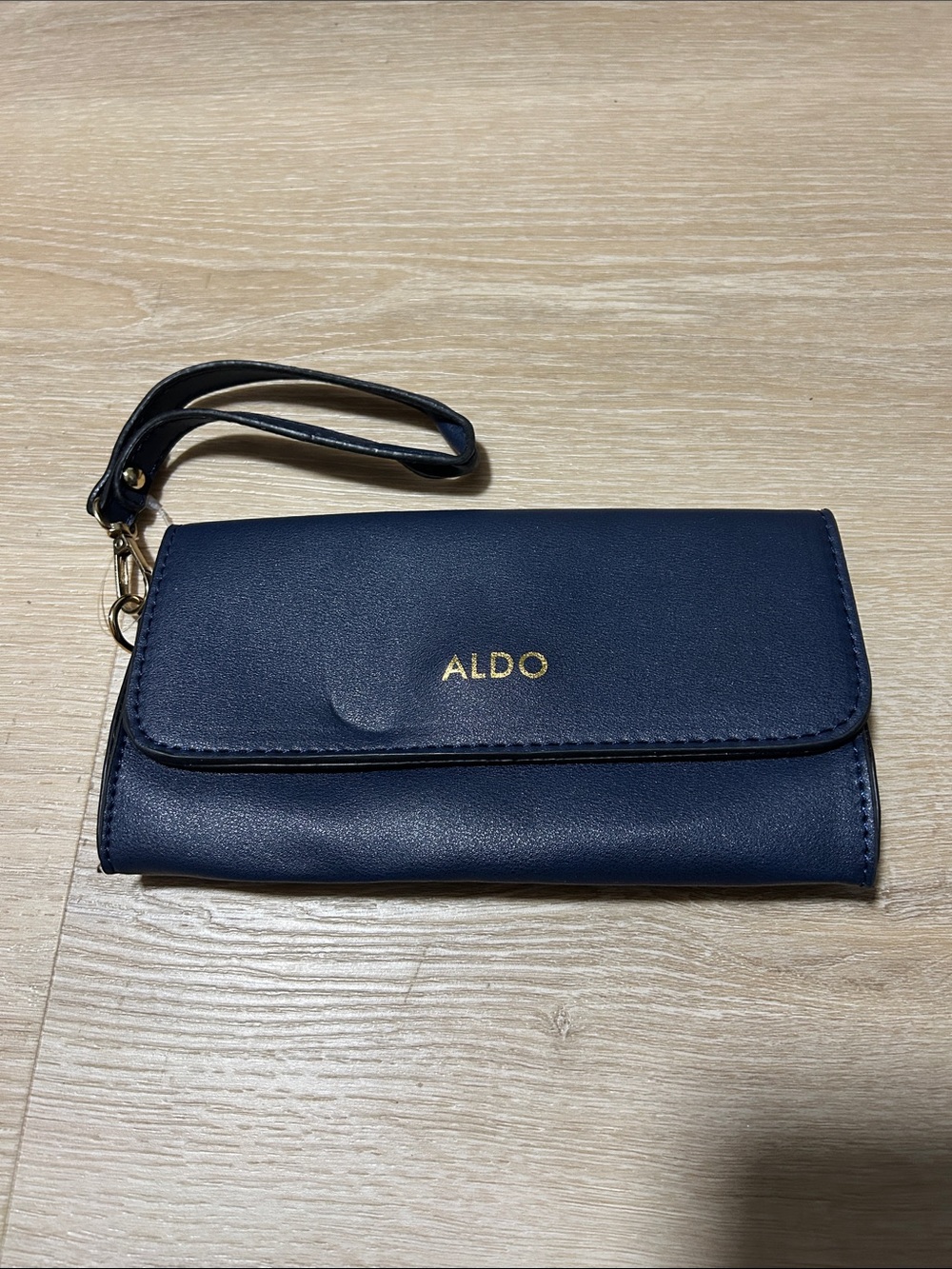 Aldo Navy Blue Wristlet Clutch with Gold Logo Accent